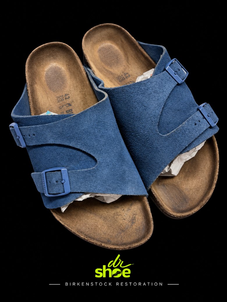 The same Birkenstock sandals with the straps recoloured deep blue